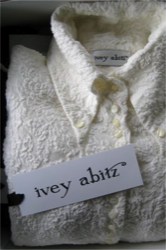 An Ivey Abitz shirt in a box