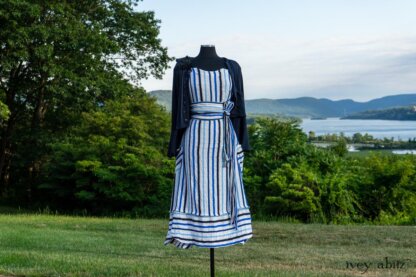 Harrison Frock in Hudson Blue Embroidered Stripe Voile; Porte Cochere Sash in Hudson Blue Embroidered Stripe Voile; Cilla Slip Frock in Peony Soft Ribbed Knit; Crest Jacket in Hudson Blue Soft Ribbed Knit; Soutache Brooch in Black Weaves. Ivey Abitz at Boscobel House and Gardens