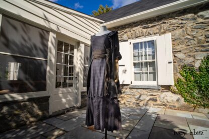 Hudson Duster Coat in Peace Soft Pinstripe Cotton; Hudson Frock in Civility Soft Check Twill; Porte Cochere Sash in Civility Floral Stretch Weave; Cilla Slip Frock in Unity Soft Ribbed Knit. Location: Entrance to Stone Cottage. Hyde Park, New York.