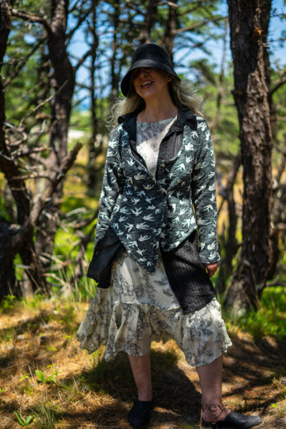Elliot Jacket in Beacon Black Flora and Fauna Knit; Inglenook Shirt Jacket in Beacon Black Stripe Twill Silk; Fairholme Dress in Ethereal Cream and Black Floral Voile; Cilla Slip Frock in Sailcloth Soft Ribbed Knit. Ivey Abitz Bespoke Clothing.
